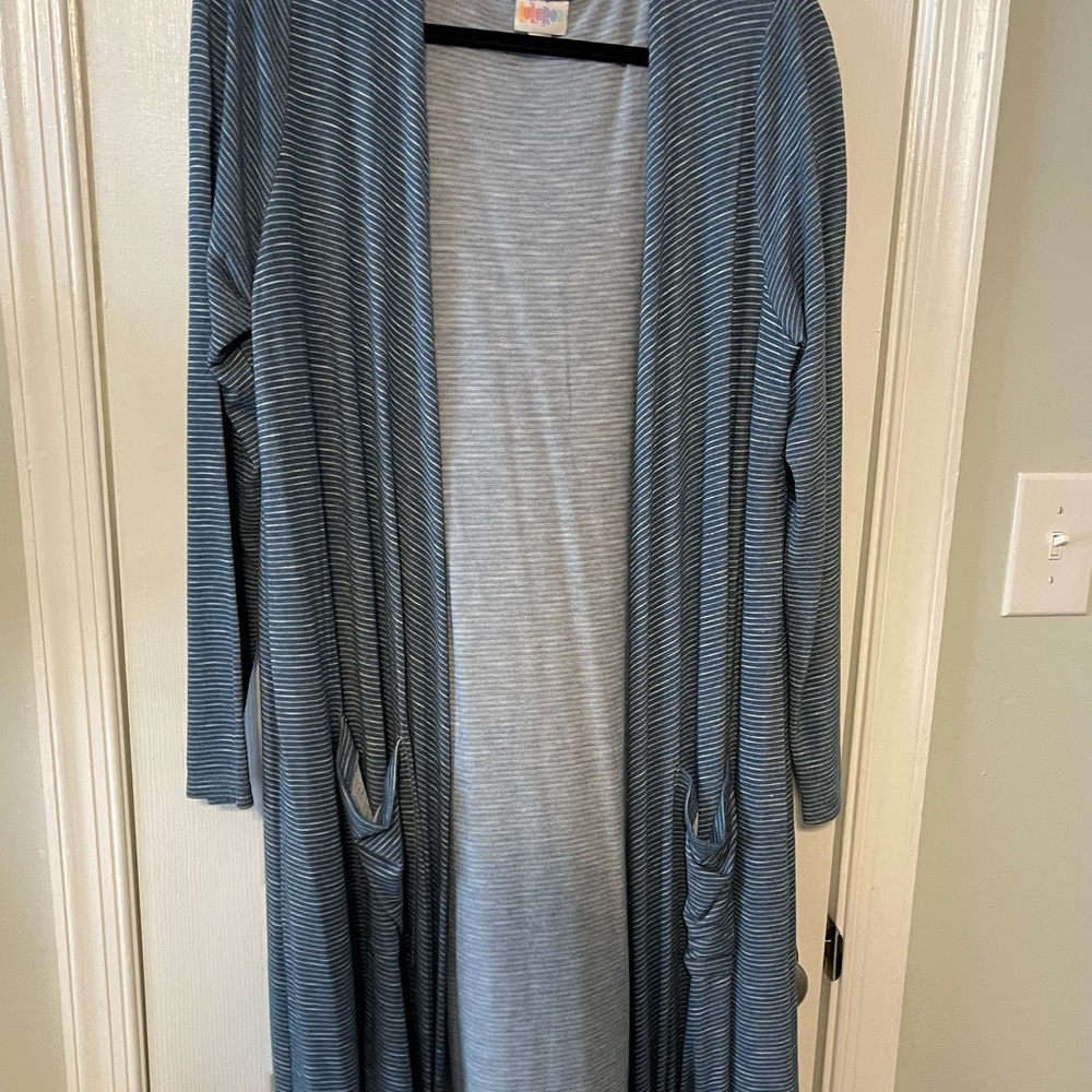 Lularoe long sweater can be tied as seen in picture